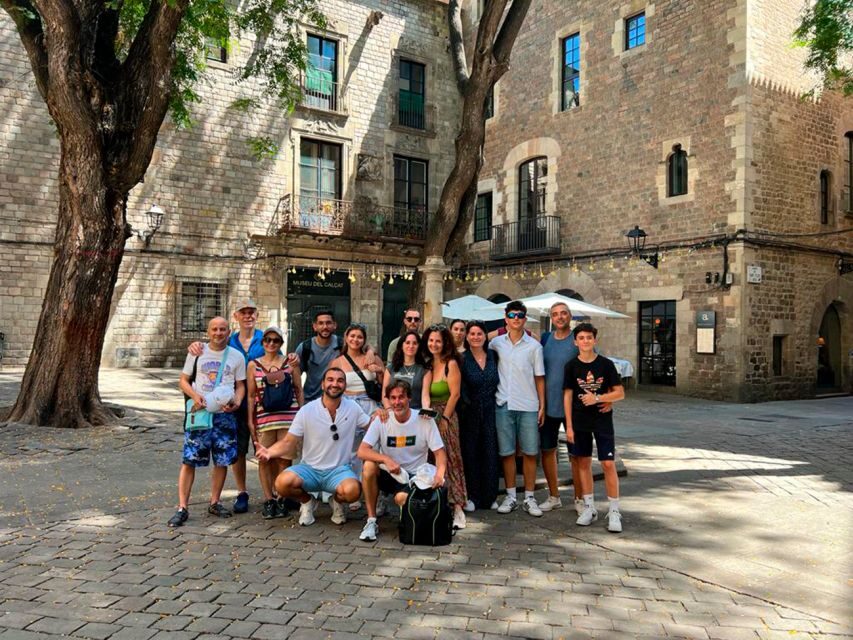 Barcelona: Sagrada Familia, Modernism, and Old Town Tour - Plaça de Catalunya and Plaça de Sant Felip Neri: the city flips tone