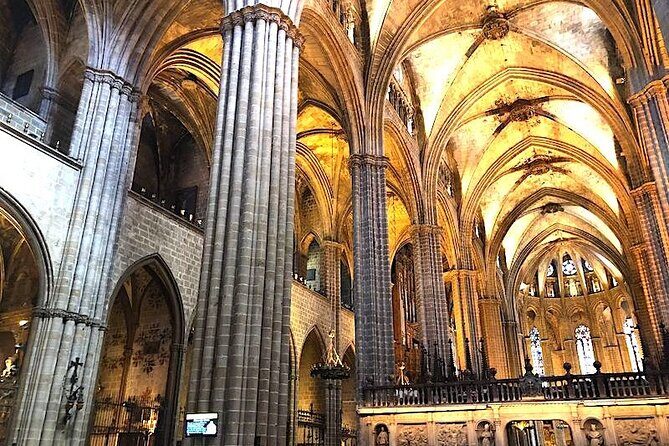 Barcelona: Sagrada Familia & Park Guell Guided Tour + Transfer - Sagrada Família Inside: Stained Glass Light, Tree Columns, and Two Big Stories
