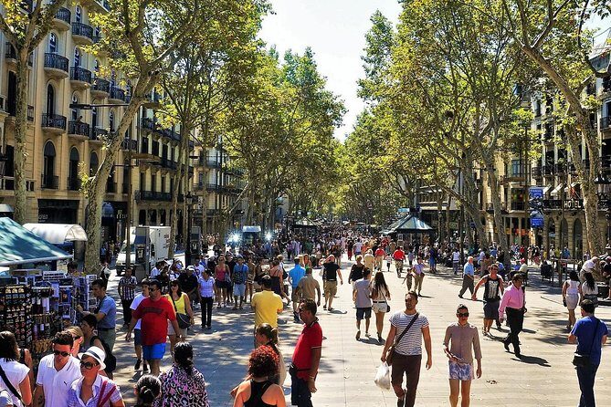 Best of Barcelona: Sagrada Familia & Park Guell Tour with Pick-up - Eixample from the Bus: Passeig de Gràcia Modernism Photos