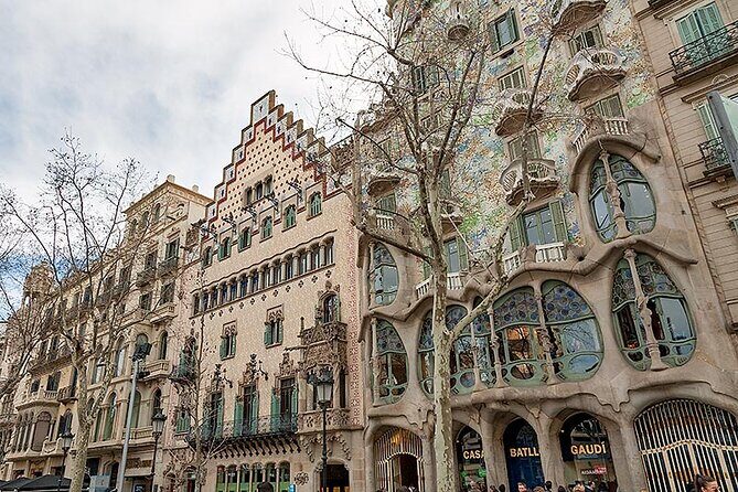 Gaudi & Sagrada Familia Donation-Based Tour in English - Palau Güell: where the rooftop steals the show
