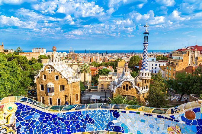 Park Guell and Sagrada Familia Tour in Barcelona - Park Güell: From Skyline Crosses to the 86 Doric Columns Room